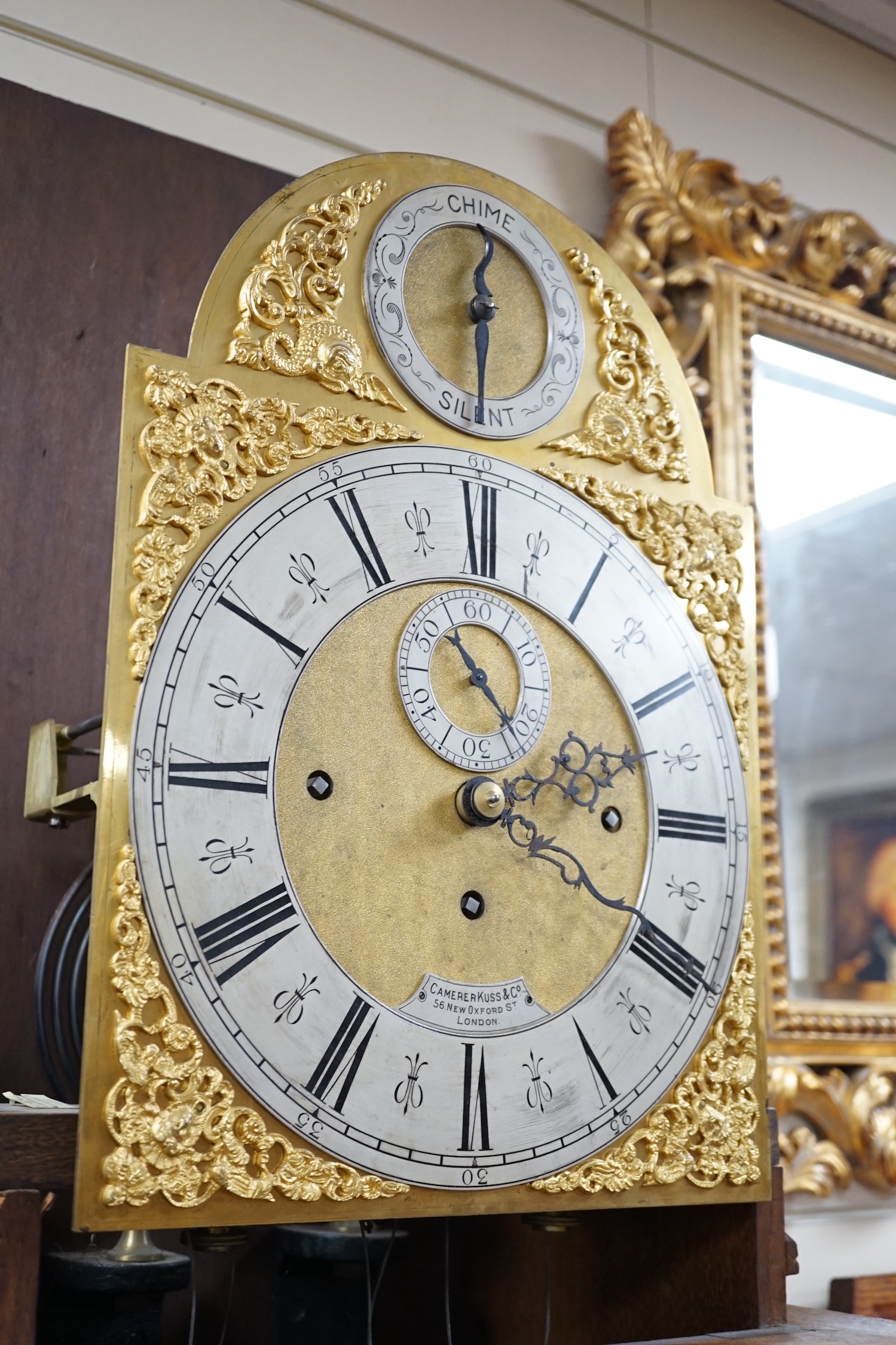 A late Victorian Camerer Cuss & Co carved oak chiming longcase clock, height 237cm *Please note the sale commences at 9am.